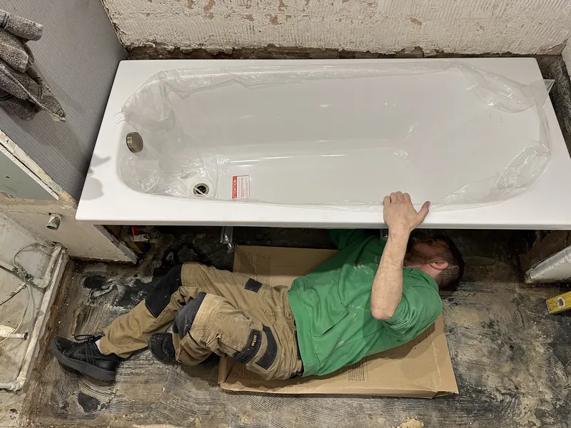Connecting bath plumbing during a bathroom installation