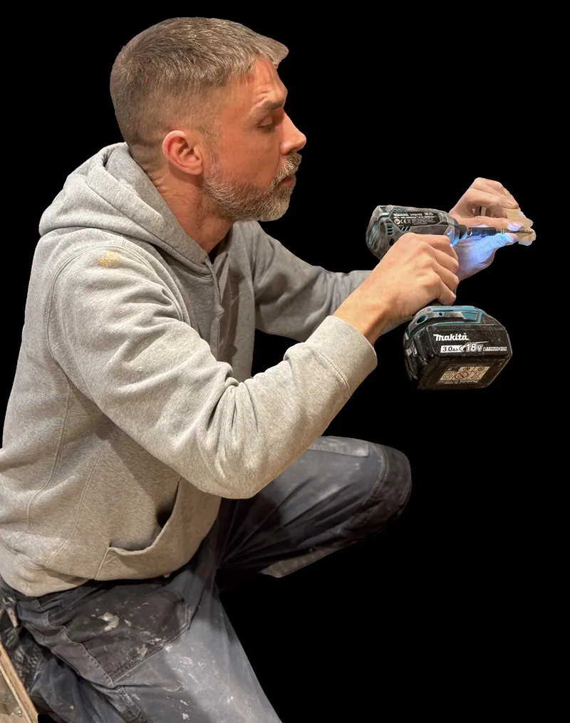 Steven at work with a cordless drill