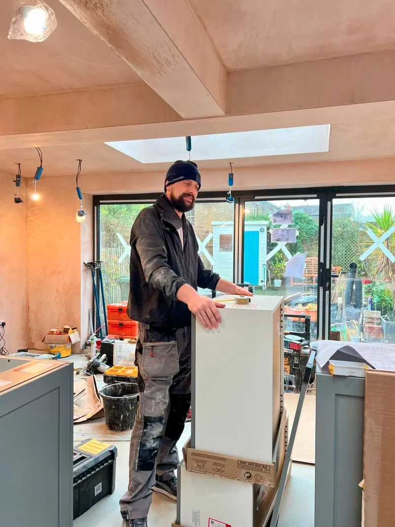 Assembling base units in a new kitchen extension